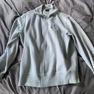 Medium mint zip up sweater that is so cute and stylish to add to a comfy outfit!